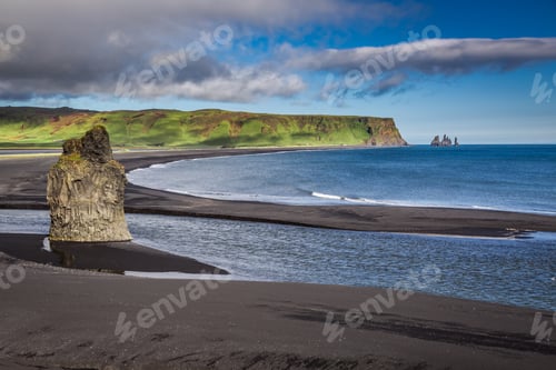 Preview: Big rock on the black beach in Iceland