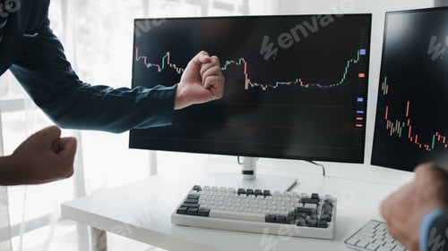 Preview: Two stock investors working together to analyze the stock market, business man is trading stocks for