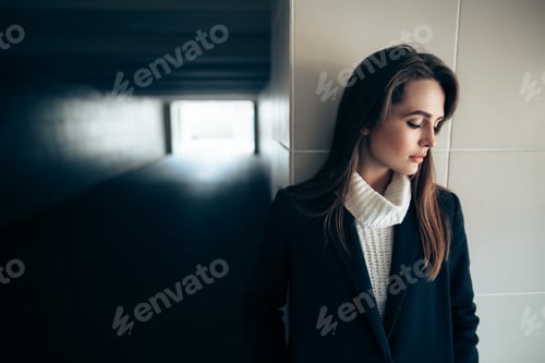 Preview: Beautiful lonely woman in a subway tunnel