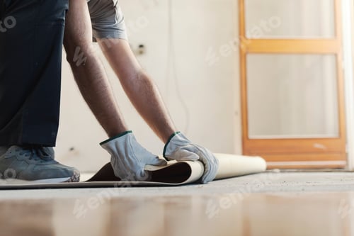 Preview: Contractor removing an old linoleum flooring