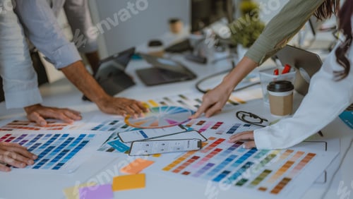 Preview: Startup team collaborates on color selection for user centric product design, optimizing experience