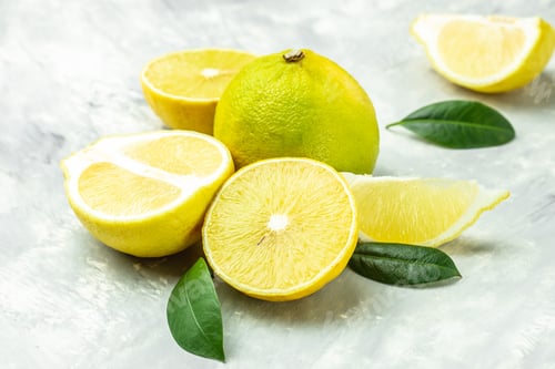 Preview: bergamots and leaves on a light background. banner, menu, recipe place for text, top view
