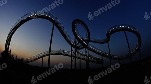 Preview: Beautiful shot of the walkable roller coaster with a blue sky in the background in Germany