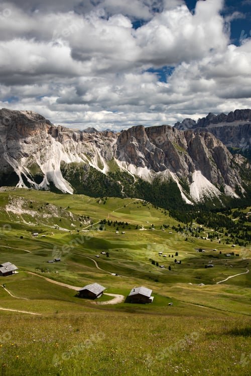 Preview: Mountain huts with the beautiful mountainous landscape of Val Gardena in Dolomites.