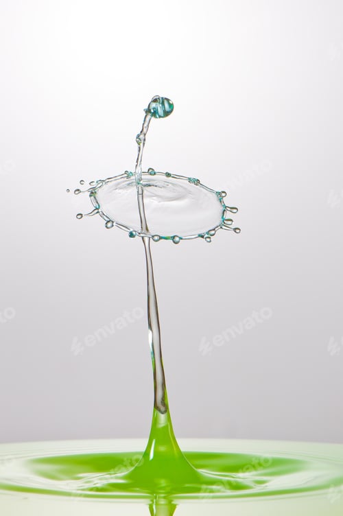 Preview: Splash of colorful liquid with high speed flash