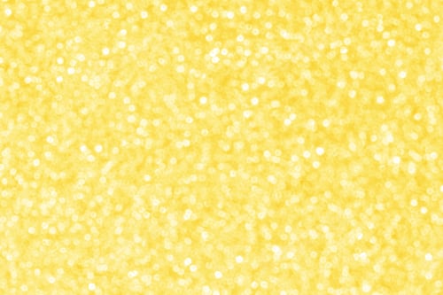 Preview: Yellow golden bokeh glitter sparkle light shiny background.