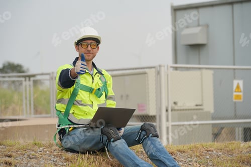 Preview: Sustainable energy industry - Engineers working at alternative renewable wind energy farm