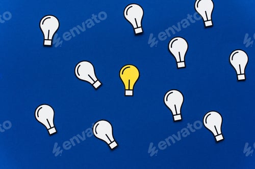 Preview: top view of paper light bulbs on blue background, business concept