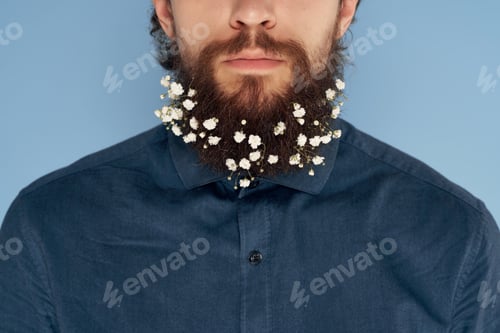 Preview: bearded man in a hat and flowers In his hair lifestyle blue background