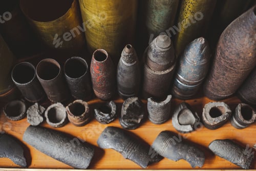Preview: Closeup shot of broken fired artillery shells in a museum