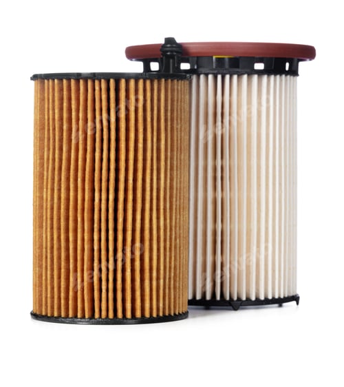 Preview: Car oil filters isolated on white, close up