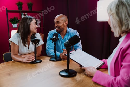 Preview: Content creators recording a podcast interview in studio