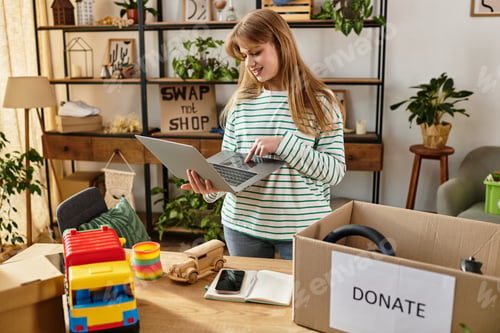 Preview: Young woman embraces sustainability by sorting and donating clothes at home