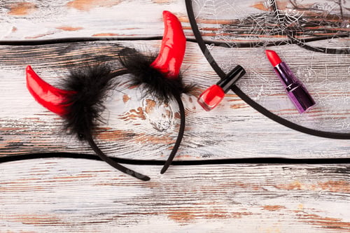 Preview: Devil horns headband and makeup accessories.