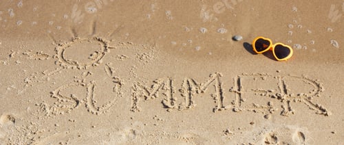 Preview: Word summer with shape of sun written on sand at beach and sunglasses. Travel and vacation time.