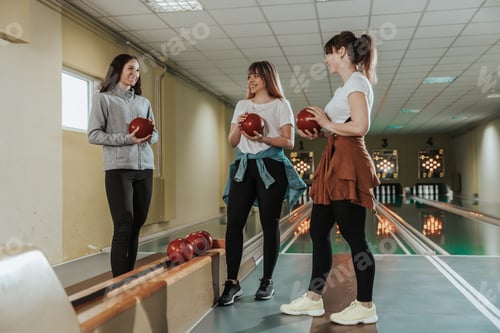 Preview: Three Female Friends Having Fun And Bowling Together