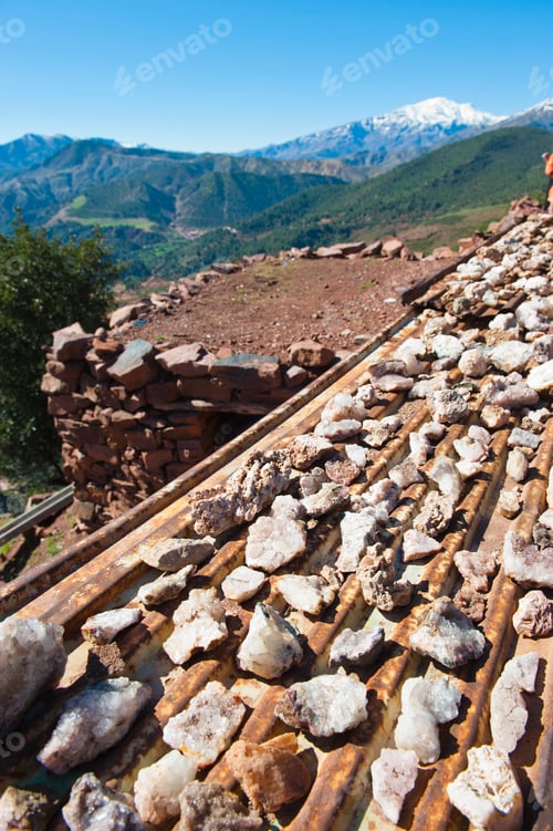 Preview: Stones for sale just outside Marrakech on the Tizi n Tichka pass with the High Atlas in the backgrou