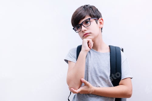 Preview: Beautiful thoughtful child boy student on isolated white background
