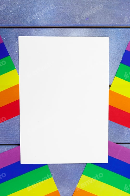 Vista previa: Bright rainbow gay flag on wooden background and blank space