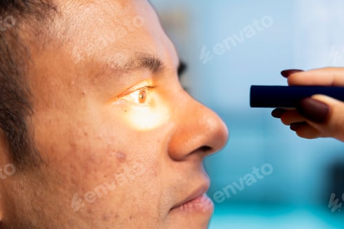Preview: Optometrist performing a vision test in a modern clinical office