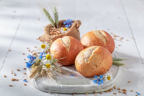 Preview: Homemade buns with cornflowers and grains from the field.