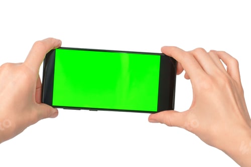 Preview: Smartphone with blank green display in female hands isolated on white background, close-up