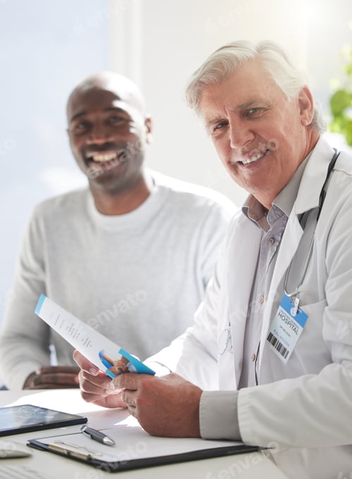 Preview: Information is power. Shot of a mature doctor having a checkup with a patient at a hospital.