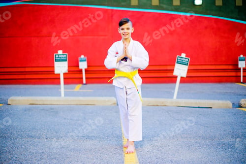 Preview: Kid doing Taekwondo outside
