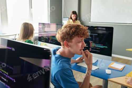 Preview: Young Man Talking to Friend during IT Class