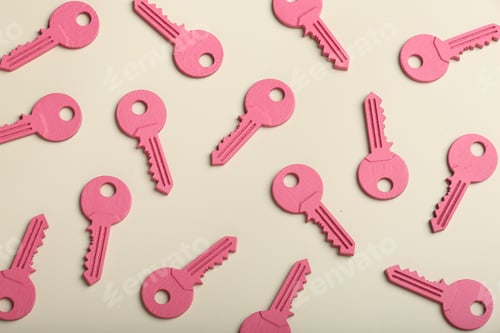 Pink Keys Arranged on Light Background