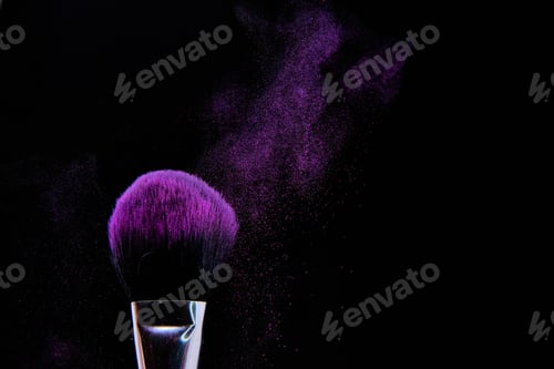 Preview: Makeup brush and purple blush splashes on a black background