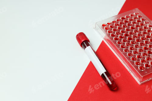 Preview: Test tube with donated blood on red and white background, space for text