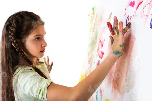 Preview: Cute girl shows paint stained hands on white