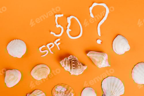 Preview: top view of seashells and number fifty near question mark and spf lettering on orange surface