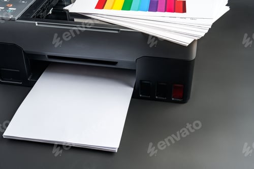 Preview: Modern laser printer on black background close up