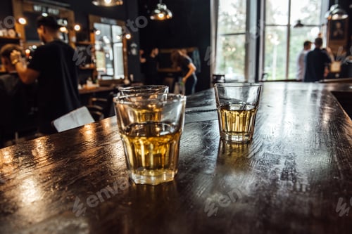 Preview: glasses of whiskey on the table