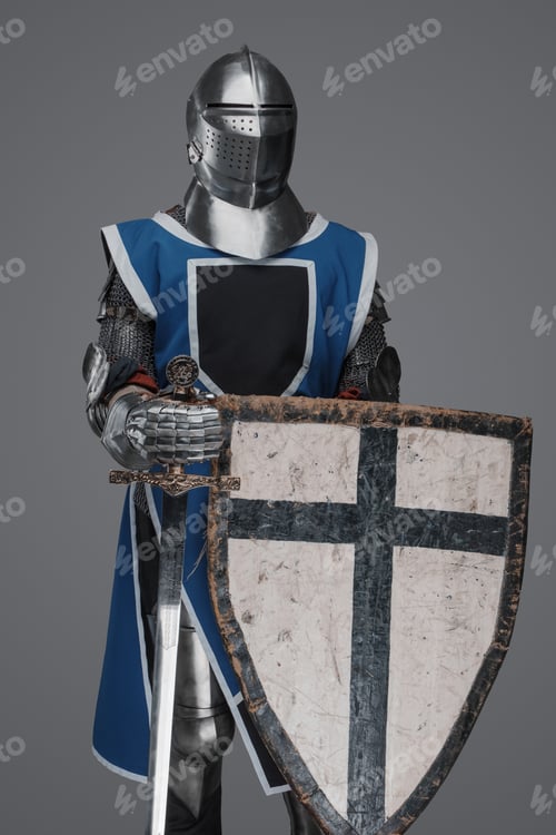 Preview: Medieval knight in blue surcoat holding a sword and shield