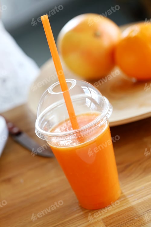 Preview: Delicious orange juice on the table