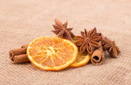 Preview: Cinnamon and oranges isolated on tissue background