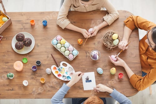 Preview: Family making colorful Easter eggs