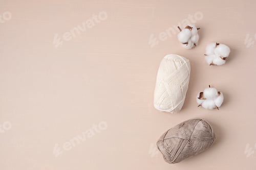 Preview: Craft knitting hobby background with yarn in natural colors