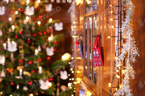 Preview: Christmas Cupboard Impression with Fairy Lights in Front of Christmas Tree - Detail