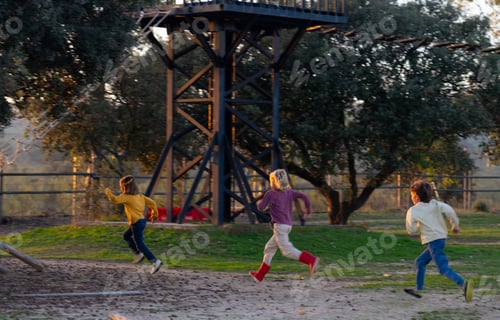 Preview: Three children playing running outdoors