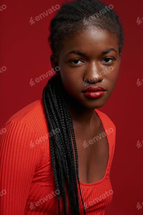 Preview: Confident African American woman in red outfit
