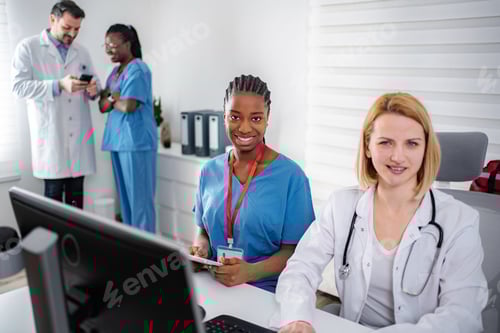 Preview: Diverse team of medical professionals working together in clinic