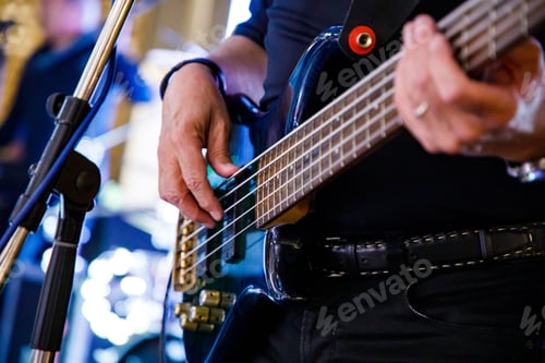 Preview: A musician plays the bass guitar
