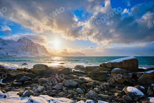 Preview: Coast of Norwegian sea on rocky coast in fjord on sunset