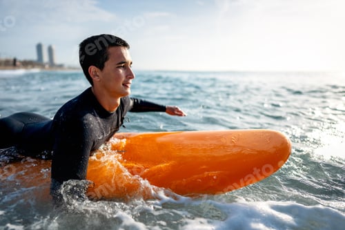 Preview: Happy young fit man with surfing board at beach, sea and ocean for summer holiday, travel adventure