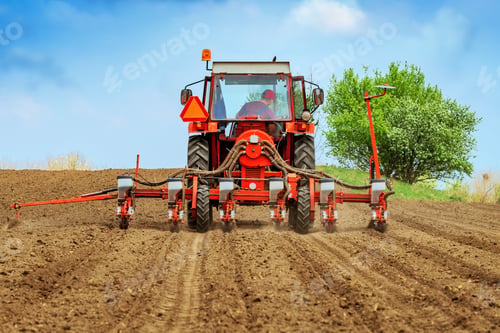 Preview: Tractor with mounted crop seeder