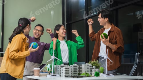 Preview: Successful business meeting, excited young person Keeping up arms and showing positive emotions